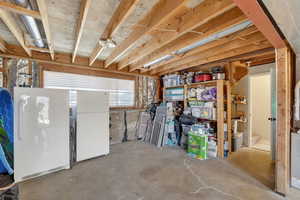 Unfinished space with large window for natural light and walk out