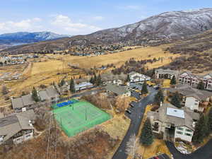 Aerial view of residential area featuring mountains