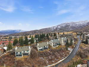 View of mountain backdrop with nearby suburban area