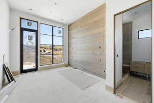 Doorway with wood walls