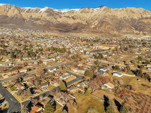 Aerial view of residential area featuring a mountain backdrop