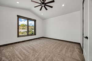 Unfurnished room featuring light carpet, ceiling fan, and recessed lighting