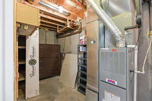Unfinished basement with heating unit