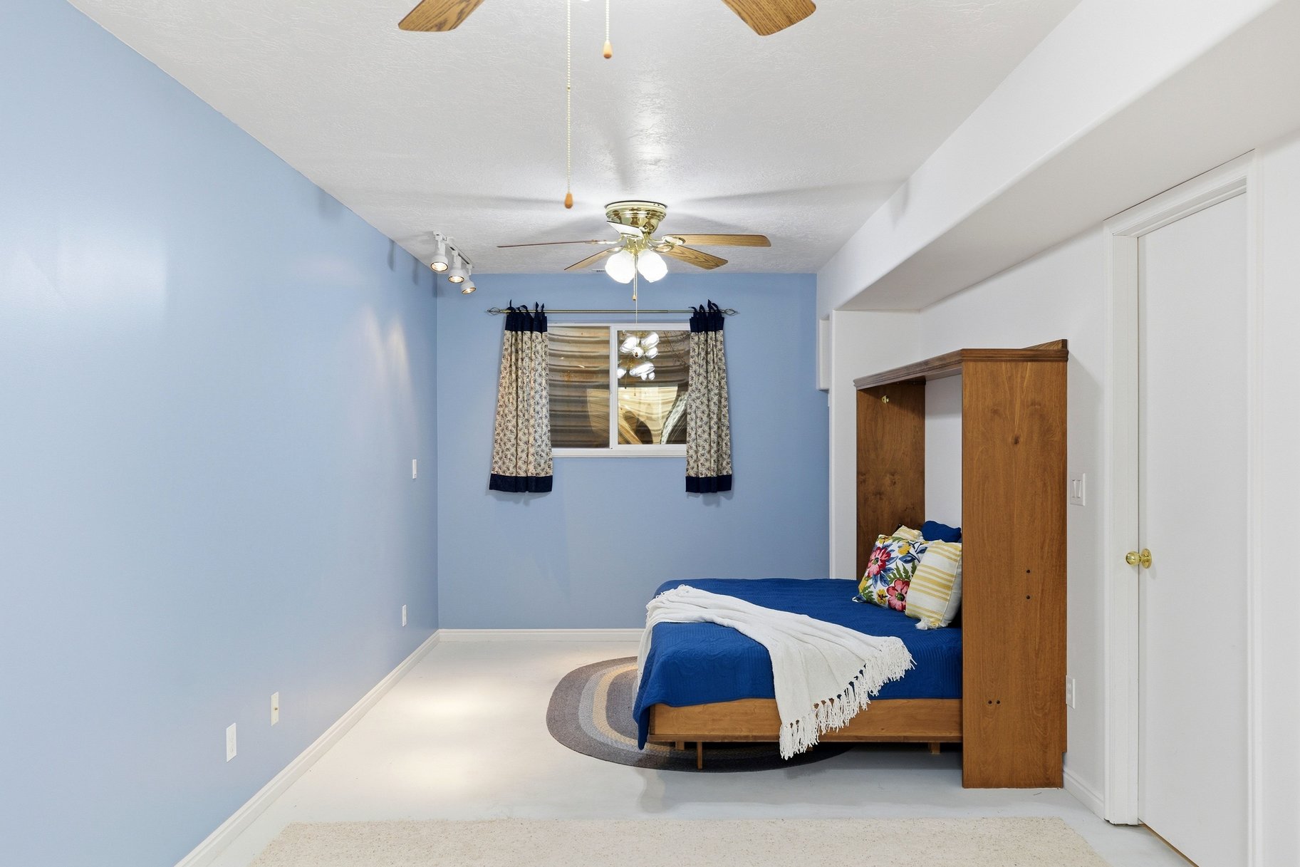 Bedroom with a ceiling fan