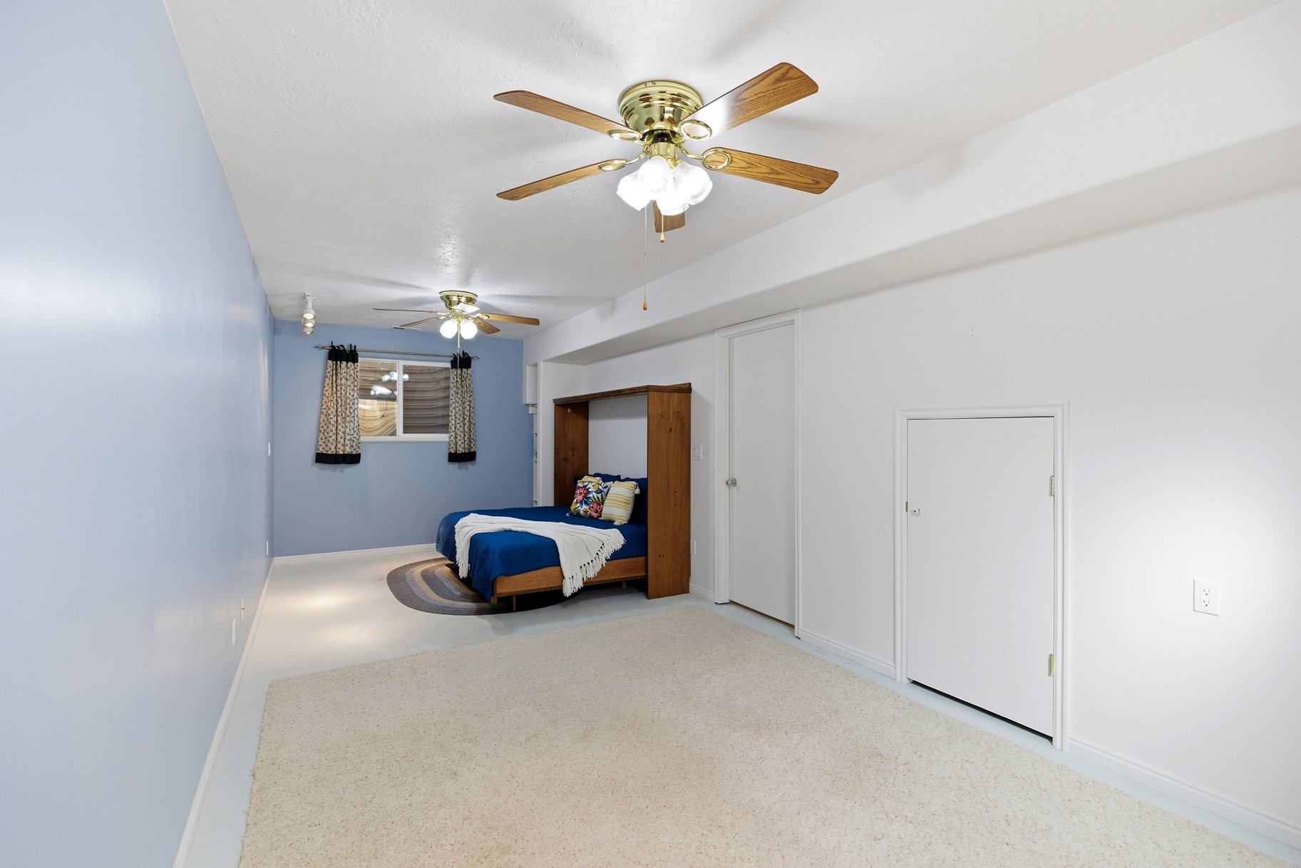 Bedroom with baseboards and ceiling fan