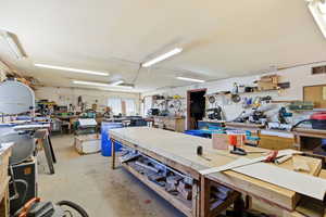 Miscellaneous room with a workshop area