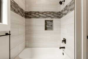 Bathroom with bathing tub / shower combination