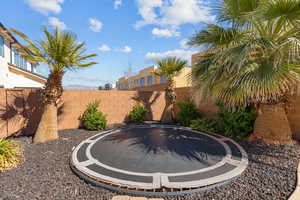 View of fenced backyard