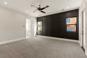 Unfurnished room featuring ceiling fan, recessed lighting, and light carpet