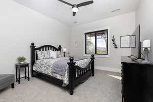 Bedroom with light carpet and ceiling fan