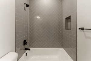 Bathroom with toilet and  shower combination