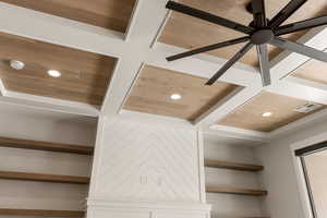 Detailed view of coffered ceiling, recessed lighting, wood ceiling, and a smoke detector