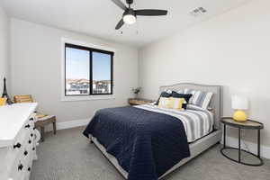 Bedroom featuring carpet floors and ceiling fan
