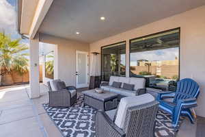View of patio with outdoor furniture