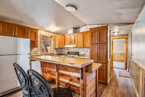 Kitchen area with moveable bar