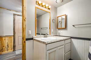 Hall Bathroom, New Vanity and wainscoting. New flooring