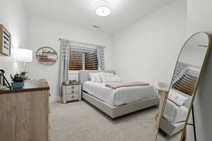 Bedroom with baseboards and a huge walk-in closet