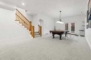 Playroom with arched walkways, pool table, carpet, and recessed lighting
