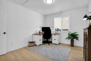 Home office featuring light wood-type flooring