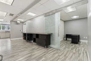 Unfurnished office with a drop ceiling