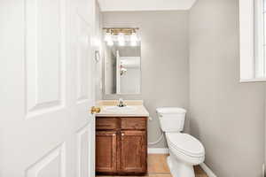 Bathroom featuring vanity and light tile patterned flooring