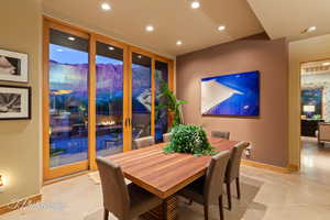 Dining space featuring recessed lighting