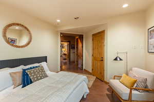 Bedroom featuring recessed lighting