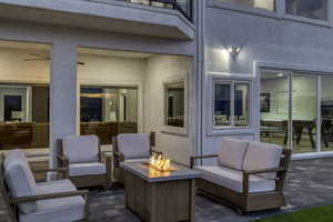 Patio / terrace featuring an outdoor living space with a fire pit and a patio area