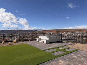 View of yard with a mountain view and a patio