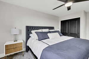 Bedroom featuring a ceiling fan and wood finished floors