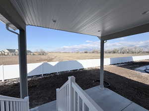 View of fenced backyard