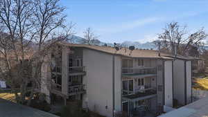 View of apartment building / complex with a mountain view