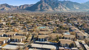 View of mountain backdrop with nearby suburban area