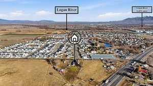 Aerial perspective of suburban area with a mountainous background