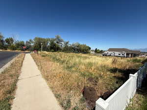 View of yard featuring a view of rural / pastoral area