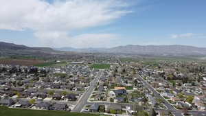 Aerial perspective of suburban area featuring mountains