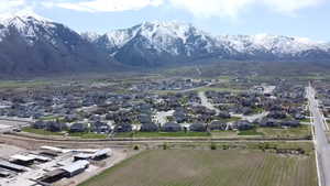 View of mountain background featuring nearby suburban area