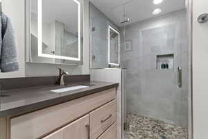 Lower Level Bathroom with Modern Fixtures and Vanity
