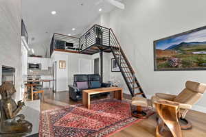Open Layout Livingroom, Vaulted Ceilings, Custom Steel and Black Walnut Stairs and Loft