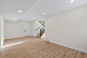 Unfurnished living room featuring recessed lighting and light wood finished floors
