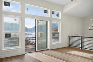Doorway featuring a mountain view and wood finished floors