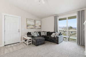 Virtual staged living room with balcony access