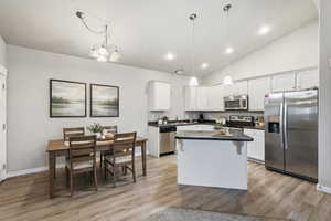 Virtually staged kitchen & dining