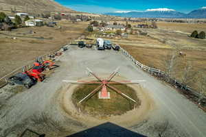 Overview of rural landscape with a mountain backdrop