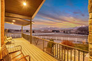 Deck at dusk with a mountain view