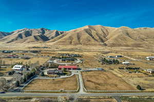View of mountain background featuring rural landscape