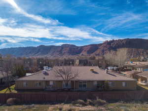 Mountain view featuring nearby suburban area