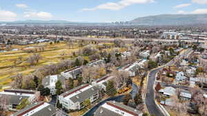 Aerial overview of property's location with a mountainous background