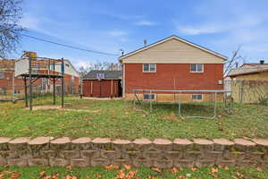 View of side of home featuring brick siding