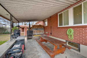 View of patio featuring outdoor dining area